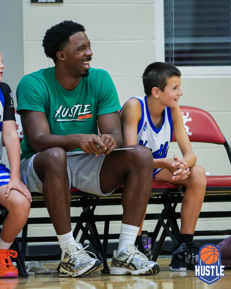 Quentin and player on the bench